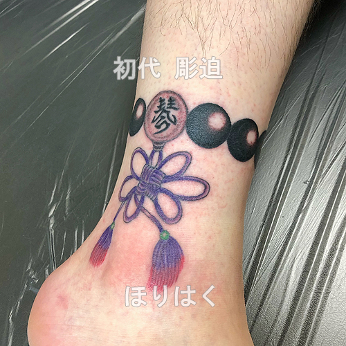 吉祥結びの紐で房付きの数珠の刺青1637_1